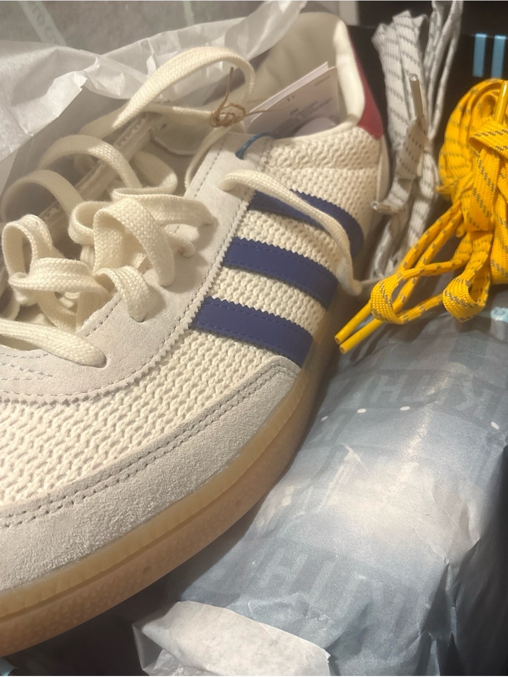 adidas Cream Knit Sneakers with Blue Stripes and Yellow Laces